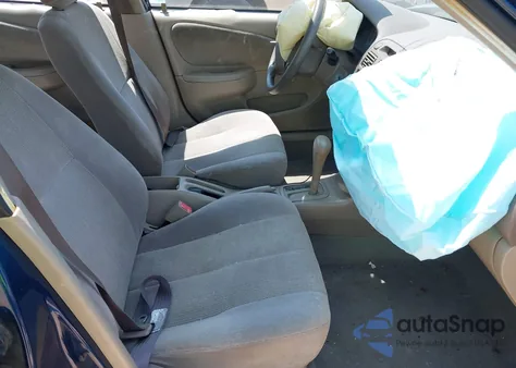 2002 Toyota Corolla Ce z USA, uszkodzony, nr VIN 1NXBR12E42Z627627